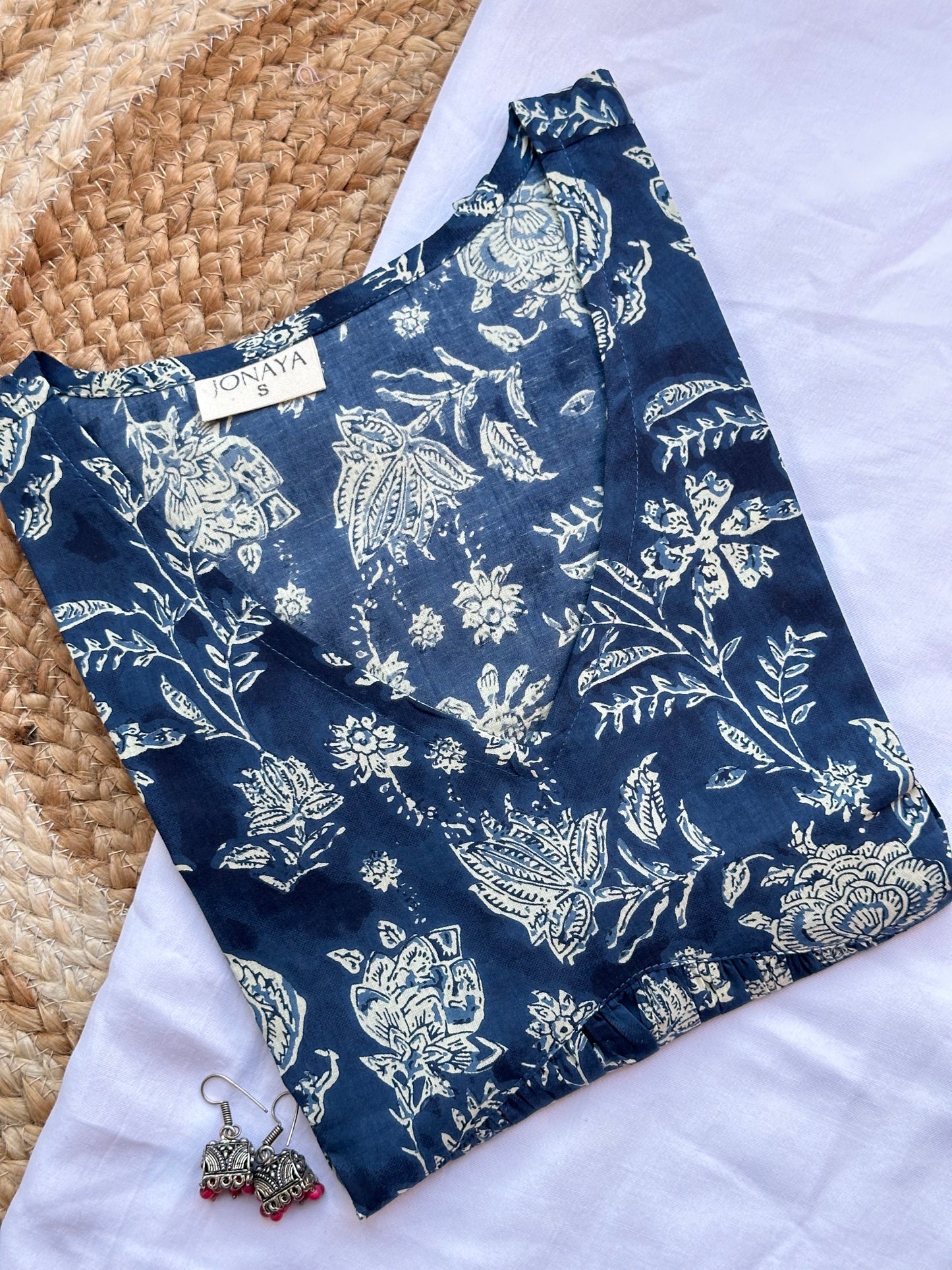 Floral indigo peplum top