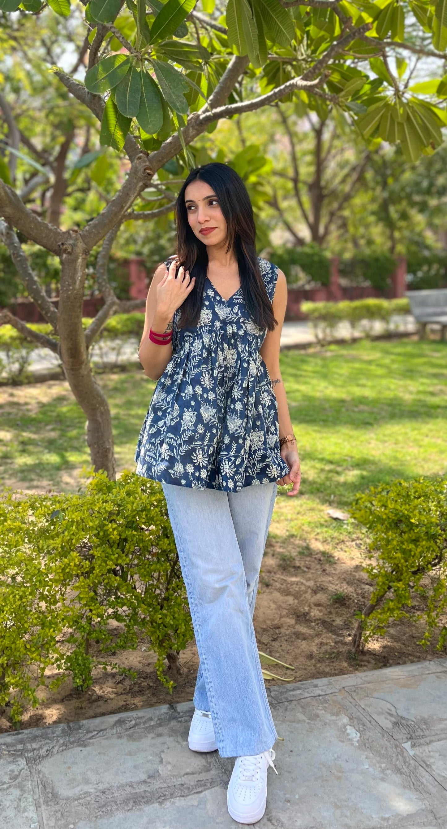 Floral indigo peplum top